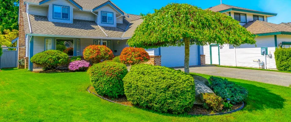 House in Concord, NC, with manicured front landscaping.