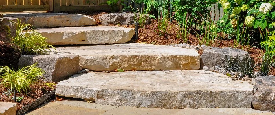 Large stone outdoor steps on a property in Charlotte, NC.